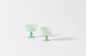 two green milk glass coppas.