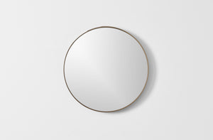 Ifuji gray maple round mirror on wall.