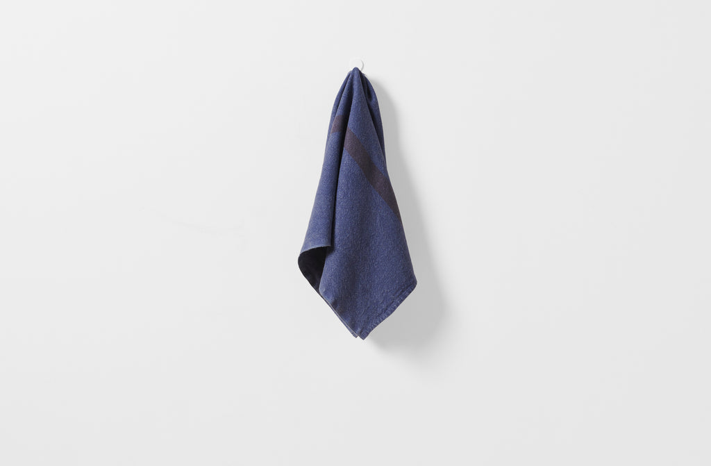 Hanging linen kitchen towel in indigo stripe