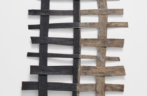 Jonathan Kline narrow black grey open grid sculpture detail.