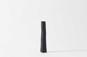 Jonathan Kline narrow woven black sculpture.