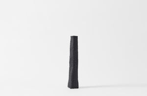 Jonathan Kline narrow woven black sculpture.