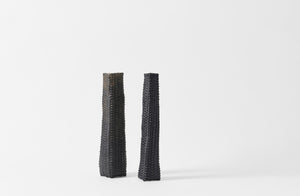 Jonathan Kline narrow woven black sculpture with narrow woven grey black sculpture.