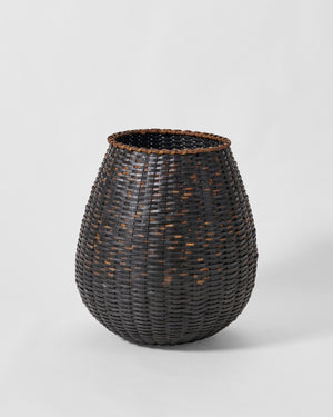 Jonathan Kline tall basket sculpture.