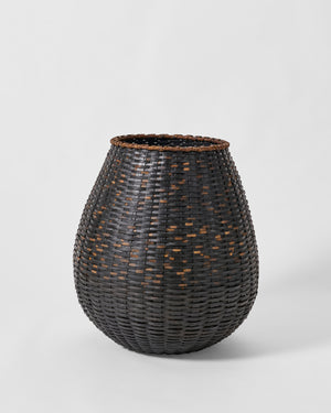 Jonathan Kline tall basket sculpture.