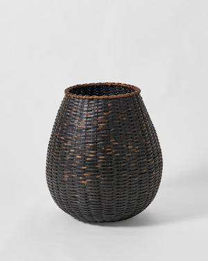 Jonathan Kline tall basket sculpture.