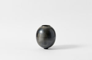 Karen Swami smoke fired vessel with gold kintsugi.