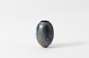 Karen Swami tall smoke fired vessel with gold kintsugi.