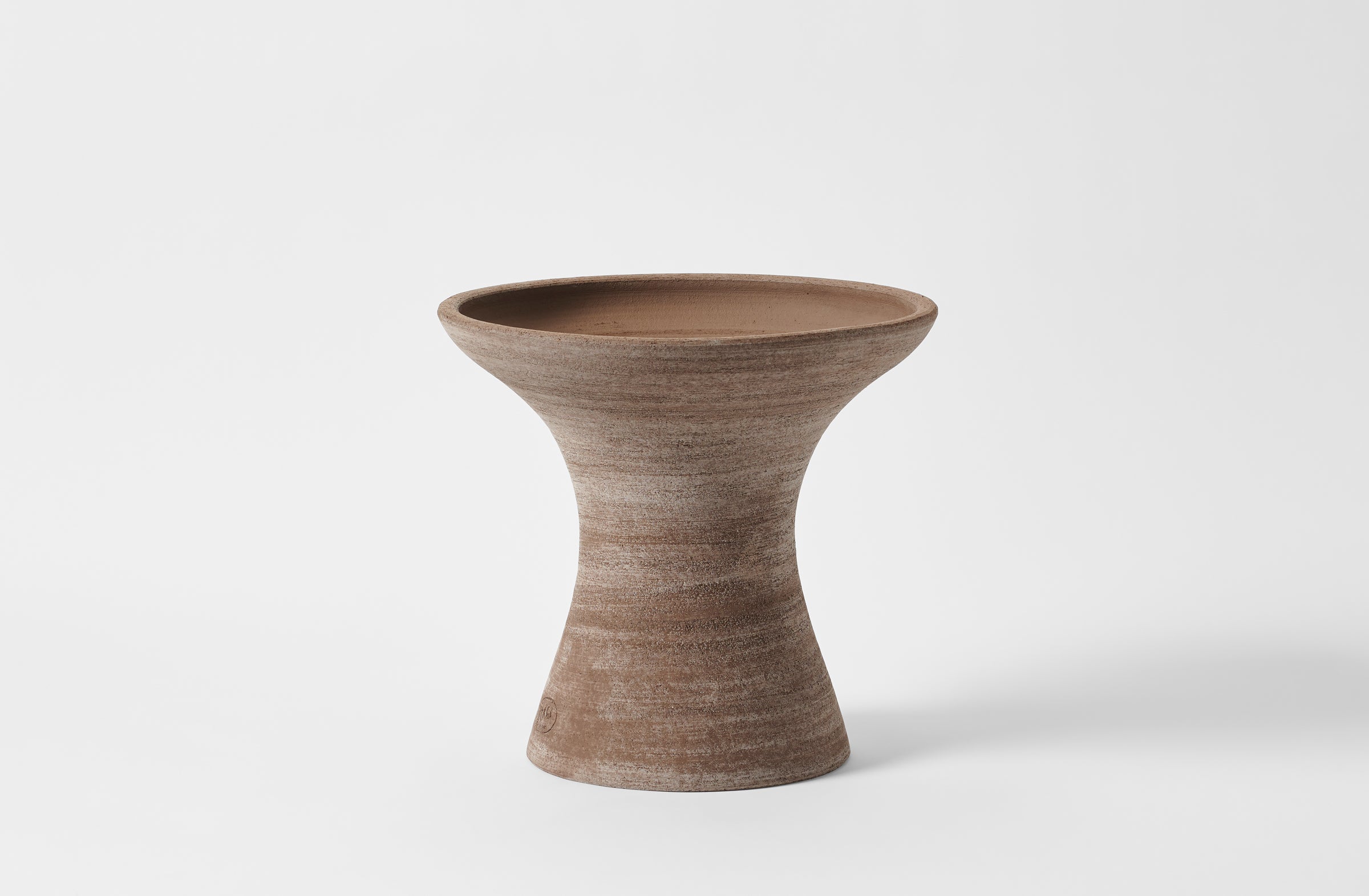 Large grey pedestal pot.