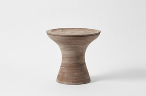 Large grey pedestal pot as table.