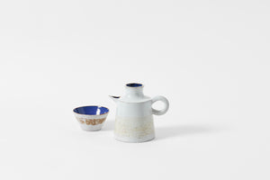 Les Argonautes midcentury white stoneware pitcher with bowl.