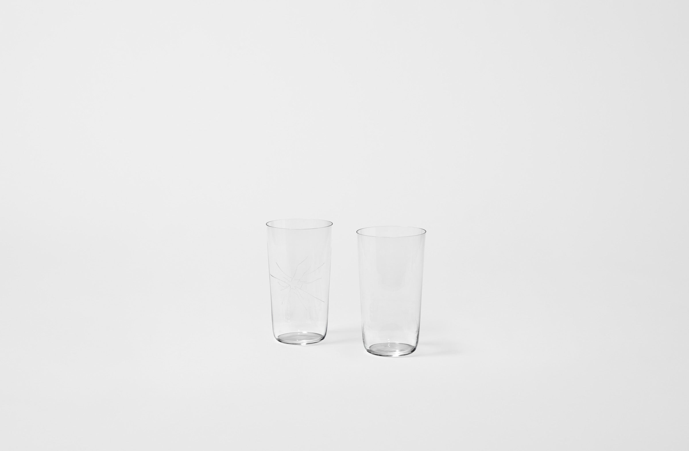 Two clear glass Lobmeyr tumblers on a white background. Default 