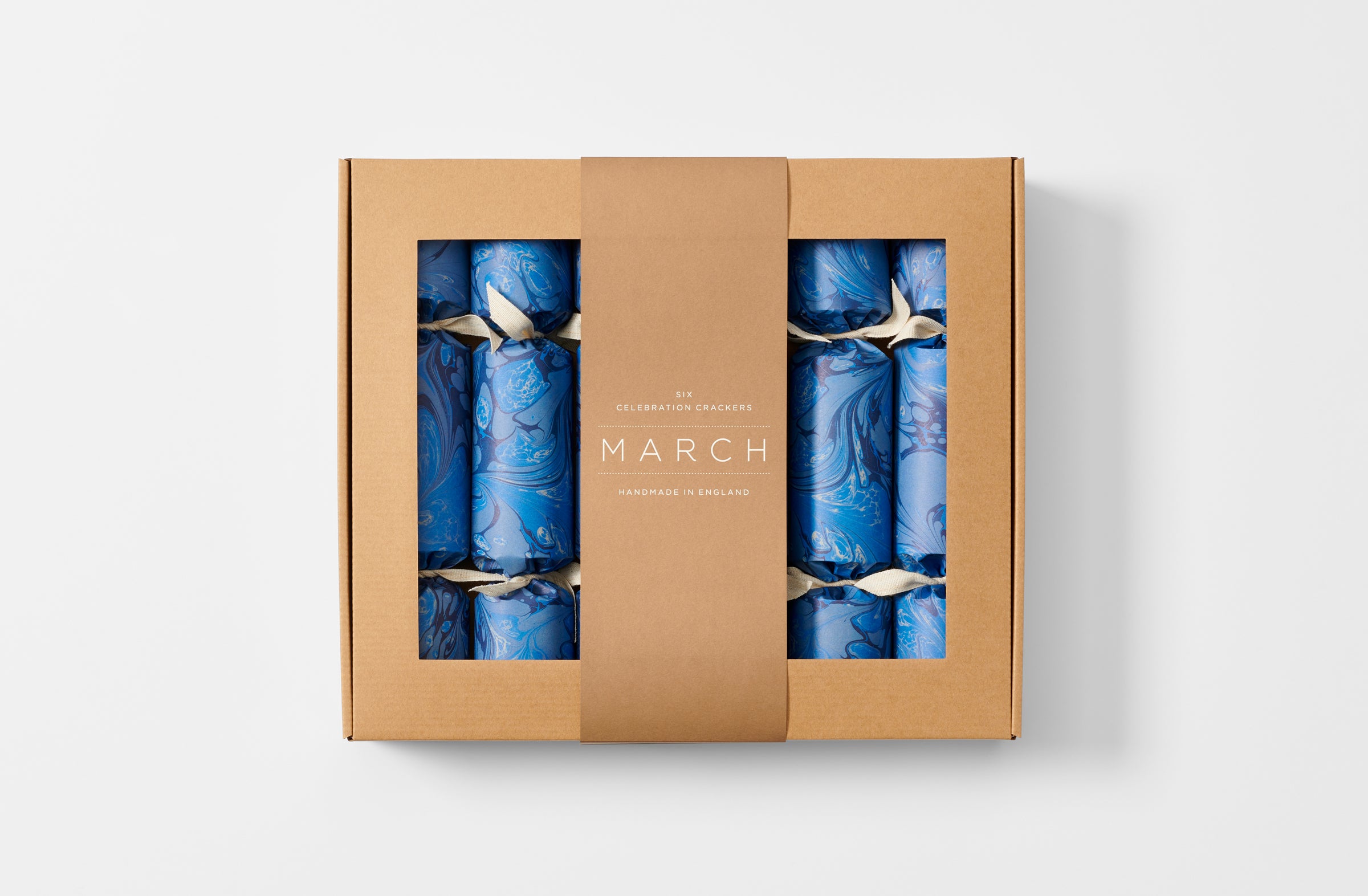 Set of six MARCH blue marble celebration crackers boxed.