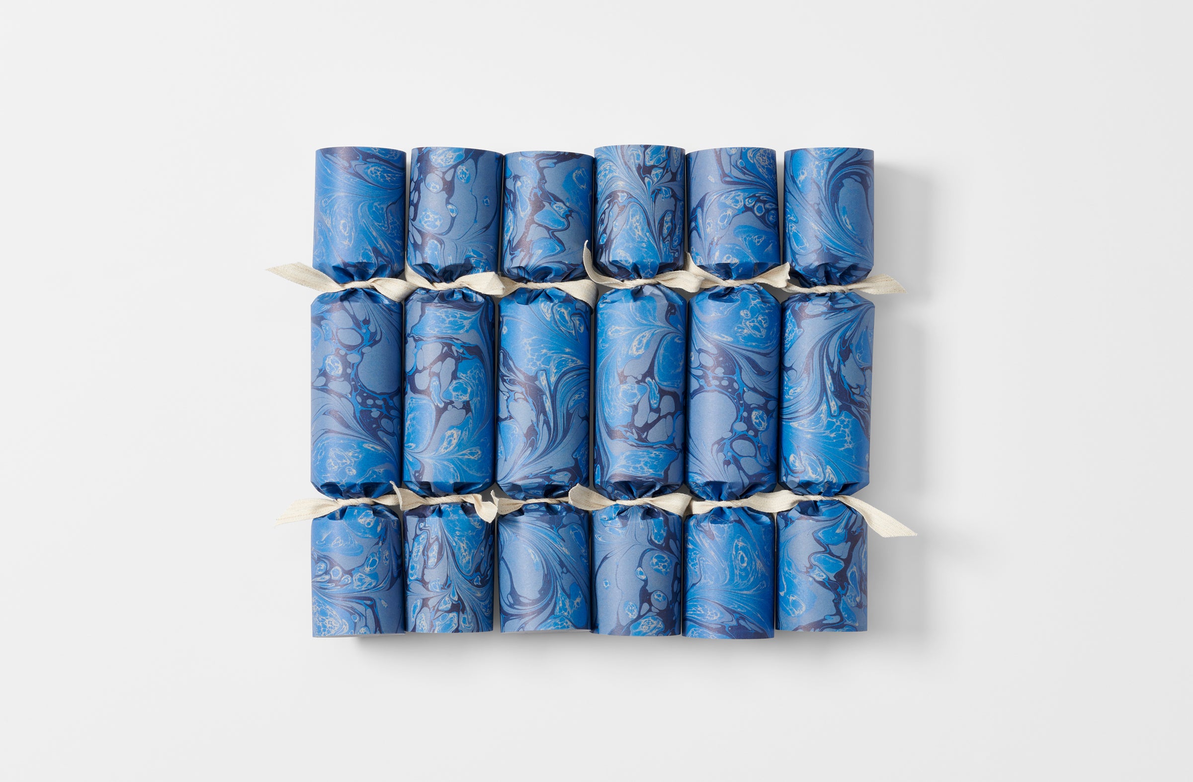 Set of six MARCH blue marble celebration crackers unboxed