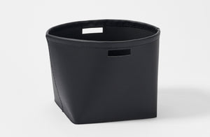 Michael Verheyden black leather storage basket.