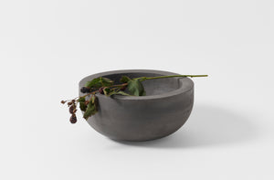 Michael Verheyden dark concrete bowl holding blackberries
