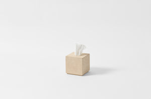 Michael Verheyden ivory leather tissue box with tissues.