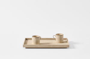 Michael Verheyden mouton suede caro tray with white Takashi Endo mugs.