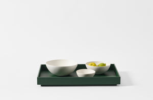 Michael Verheyden racing green leather poster tray with Rina Minardi bowls.