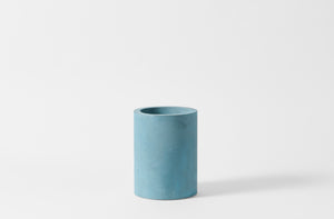 Turquoise Michael Verheyden wide concrete vase.