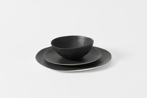 Molosco matte black dinnerware set nested. Default