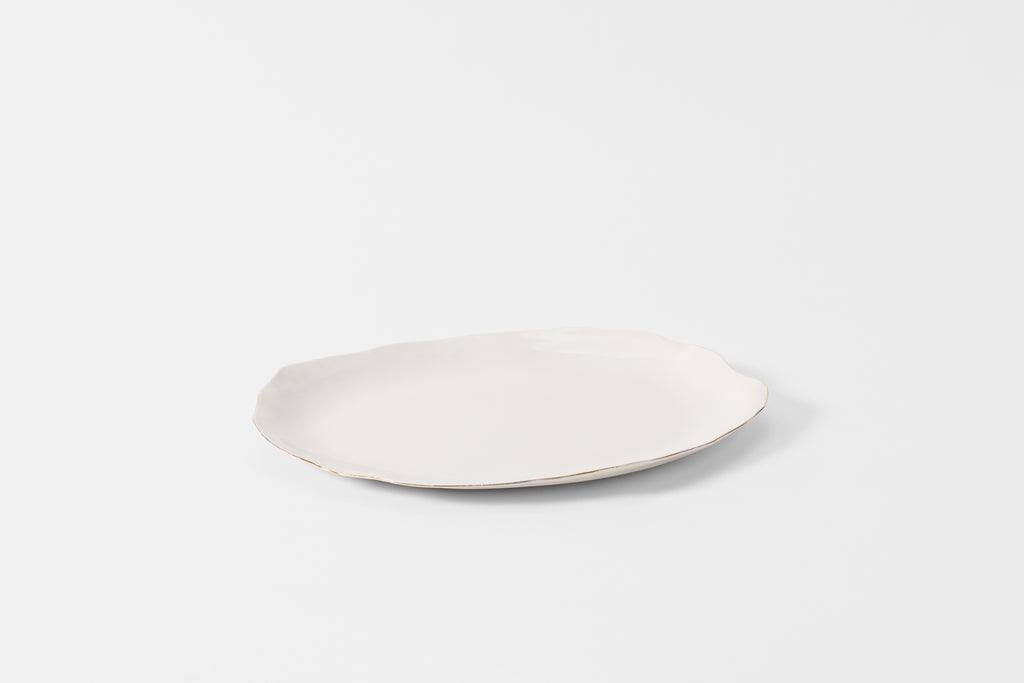 Large White Molosco  serving platter with gold rim. 