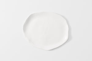 Molosco large white serving platter overhead detail.