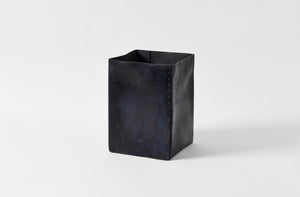 Peter Speliopoulos leather waste basket.