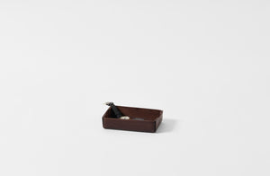 Peter Speliopoulos chestnut leather petite rectangle tray with watch.