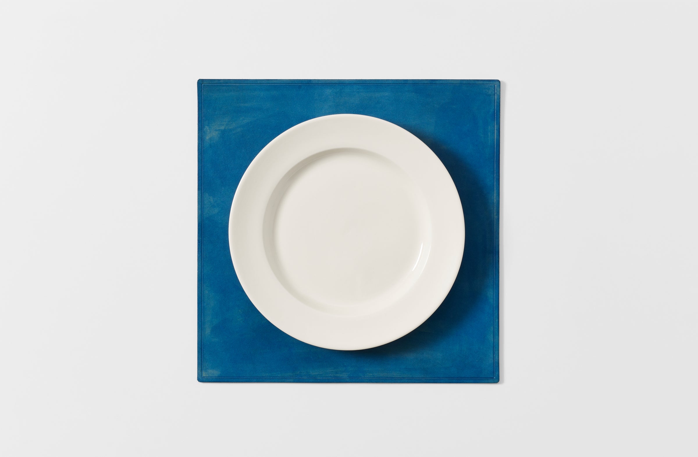 Peter speliopoulos denim painted leather placemat