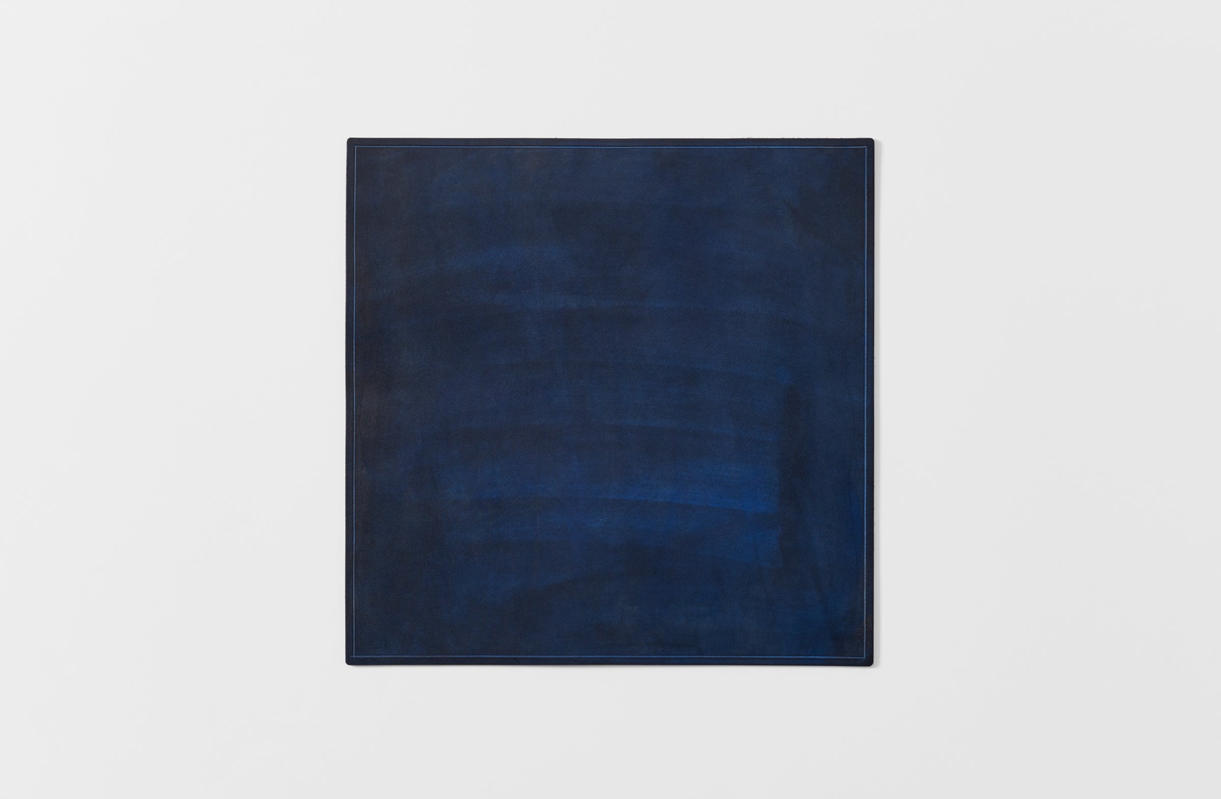 Peter Speliopoulos indigo painted leather placemat 