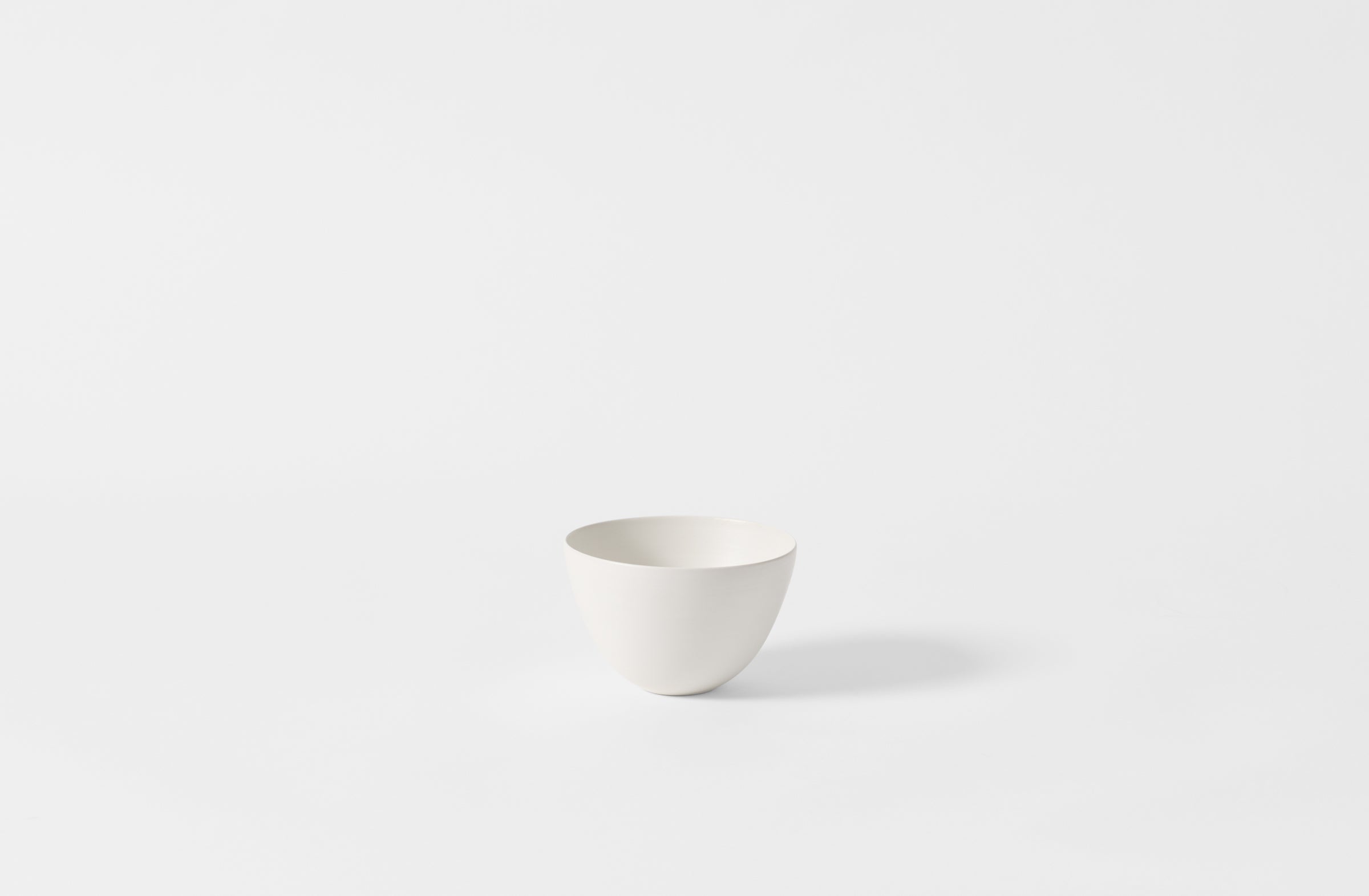 Small deep white Rina Menardi bowl.