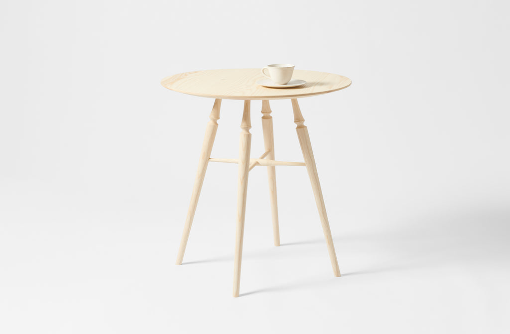 Sawyer Made ash round table with teacup and saucer. 