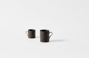 Takashi Endo large black mug with small black mug.