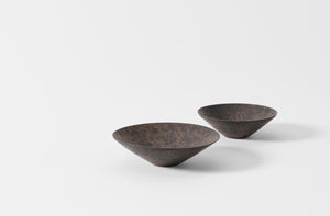 Takashi Endo small and large black shallow bowls.