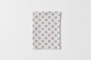 Folded Tori Murphy indigo diamond kitchen towel.