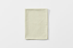 Tori Murphy sage strip kitchen towel folded.