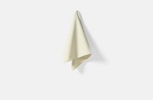 Tori Murphy sage stripe kitchen towel hanging.