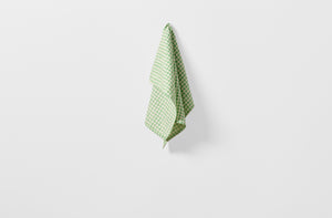 Tori Murphy spruce check kitchen towel hanging.