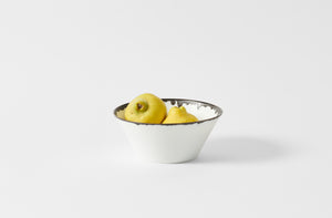 Yuta Miyazaki indigo rim bowl holding quince fruits.