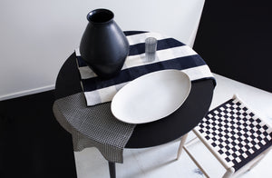 Black-and-white-checkerboard-layered-textiles-decor-and-furniture