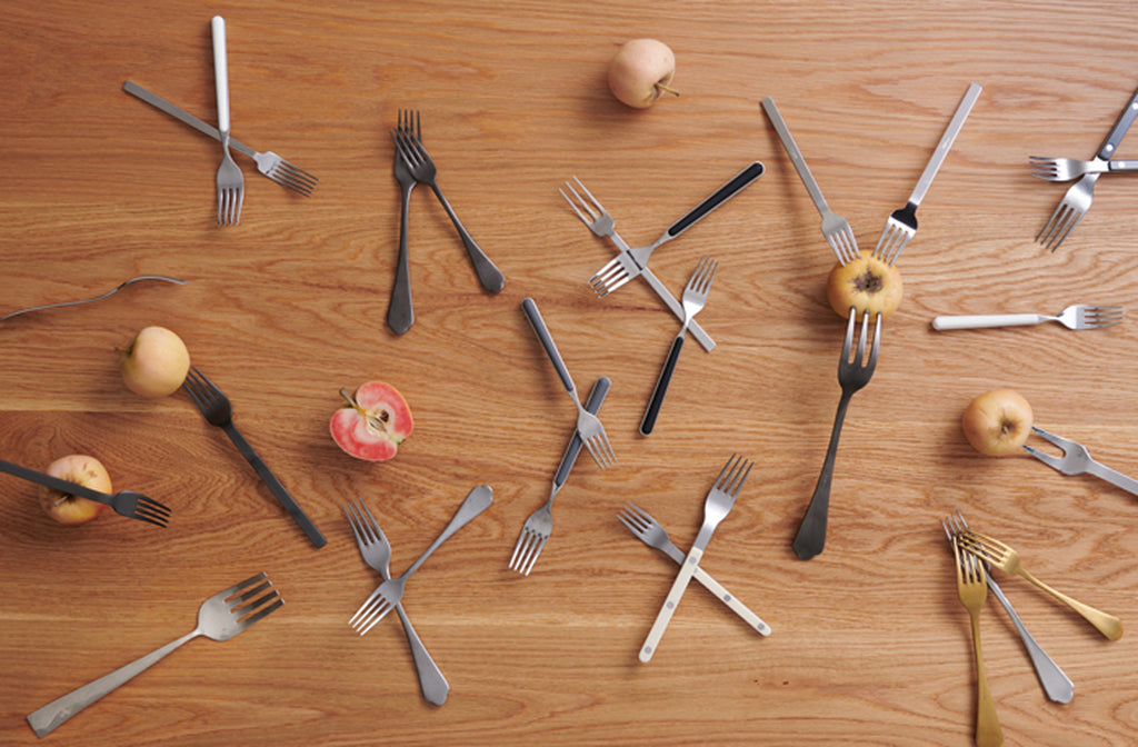 Flatware-forks-assortment-overhead-still-life-with-apples