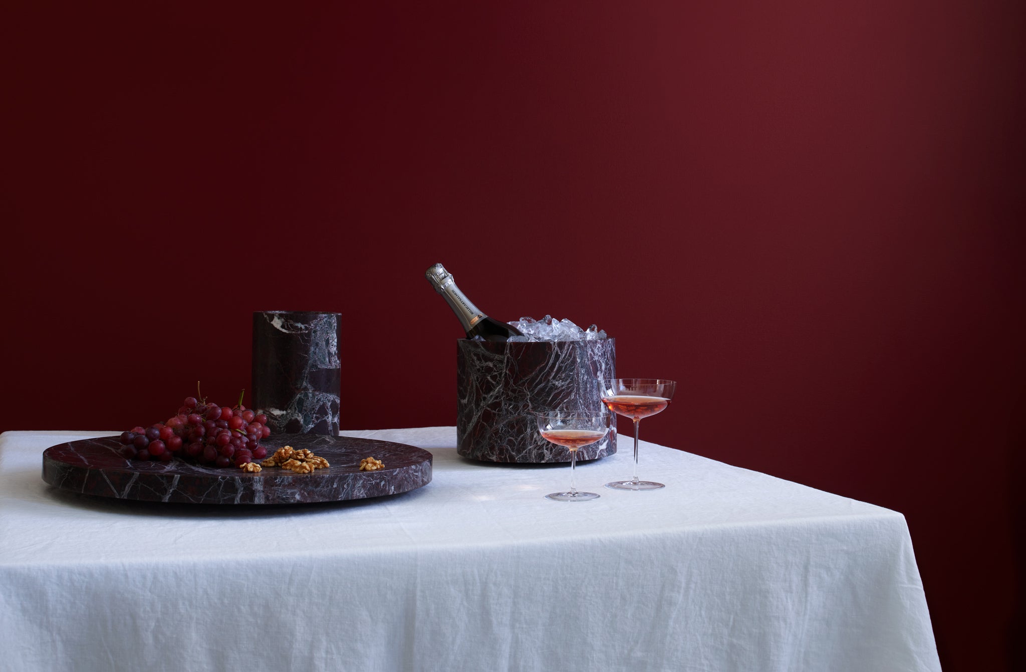 Michael-verheyden-rossa-marble-bar-set-with-champagne-filled-lobmeyr-coupe-glasses.