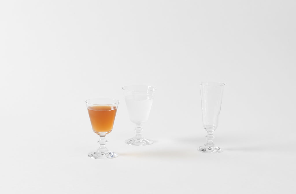 https://marchsf.com/cdn/shop/products/borosilicate-simple-stemware-glassware-filled_1024x.jpg?v=1594858582