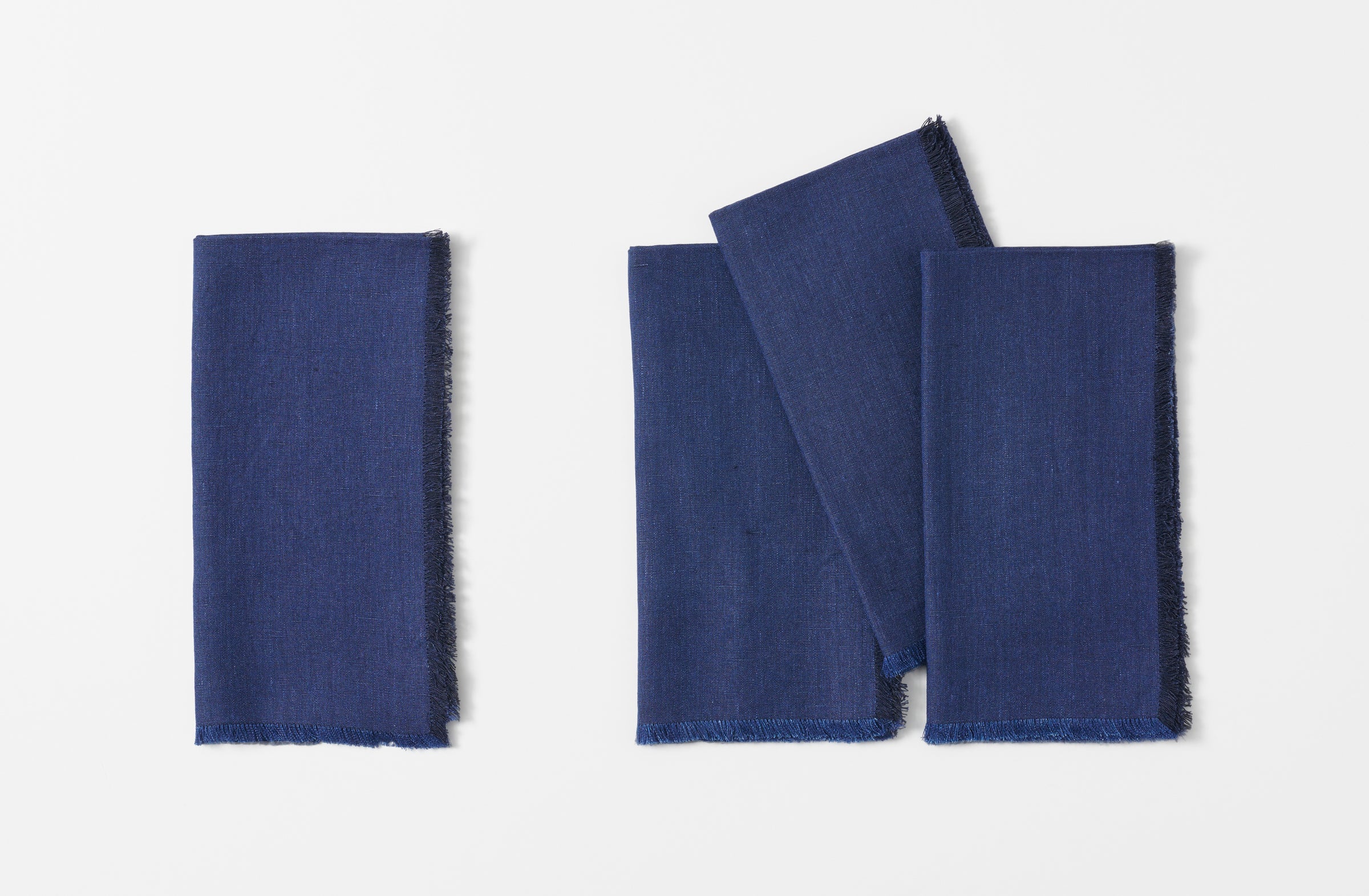 boxwood belgian linen navy fringed dinner napkins shown folded