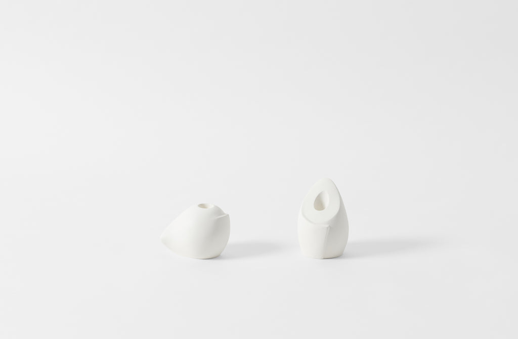 carol leskanic white gesso short and tall sculptural candlesticks