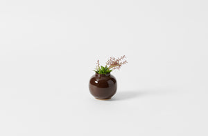 christiane perrochon shiny dark brown petite boule stoneware vase set with rust floral sprigs
