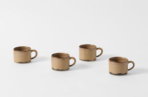 four christiane perrochon yellow brown spot stoneware mugs