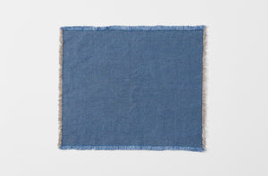 indigo blue hopsack linen fringed placemat shown from above