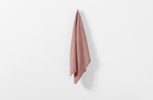 pink kitchen towel hung